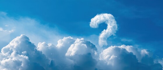 The Cloud Shaped Like a Question Mark Above Puffy White Clouds in Blue Sky