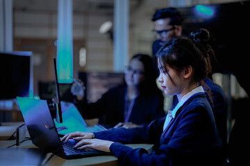 A team of financial analysts in a trading room monitors real-time market data. The lead analyst points out a critical trend, guiding the team's investment strategy after hours.