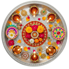 Vibrant Diwali puja thali with diyas, sweets, flowers, and ornate decorations for festive celebration