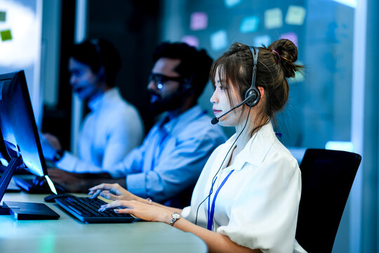 A contact center manager provides on the job training to a new CSR, demonstrating proper use of the CRM and knowledge base to improve her First-Call Resolution FCR metrics.