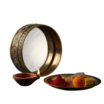 Traditional Indian Karwa Chauth Thali with Sieve, Diya, and Sweets