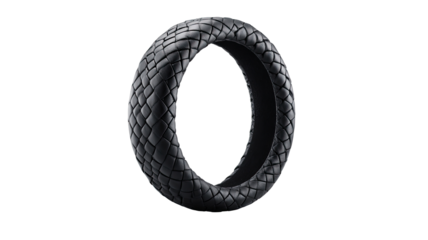 Close-up view of a dark gray motorcycle tire, circular shape, textured tread pattern