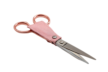Rose gold scissors, pink leather case, studio shot, craft supplies