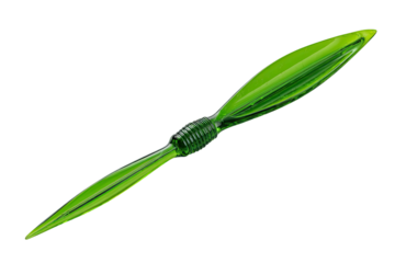 Green plastic citrus zester on black background