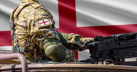 Fototapeta premium Saint George flag with soldier at machine gun turret in front of it. Closeup side view.
