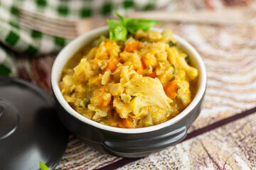 Healthy vegetable lunch with yellow pea porridge