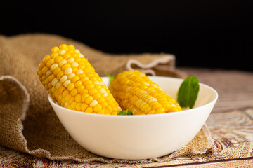 close-up of juicy corn in a white plate