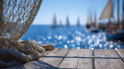 Fishing nets folded neatly on the edge of a sunlit pier, wooden texture rich with cracks, horizon dotted with white sails and shimmering sea