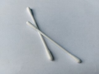 Cotton buds isolated on white background, personal care accessory commonly used for ear cleaning and hygiene.