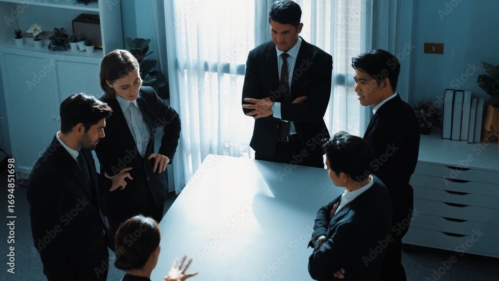 Poster top view of professional business team pointing at meeting table while brainstorm marketing idea at 