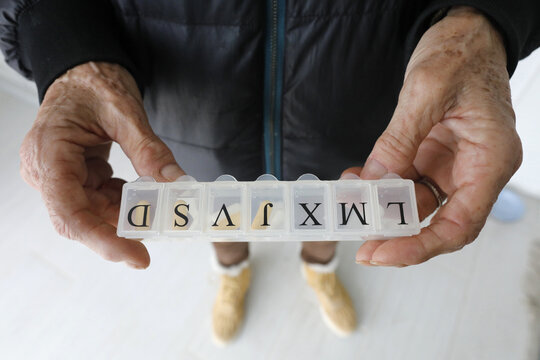 Elderly woman&acirc;&euro;&trade;s pill box. Paris, France