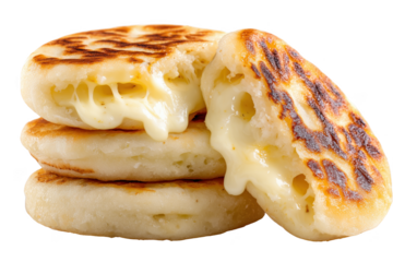 Stack of melted cheese filled arepas with grilled marks isolated on a transparent background food stuffed