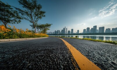 Urban park road leading to city skyline