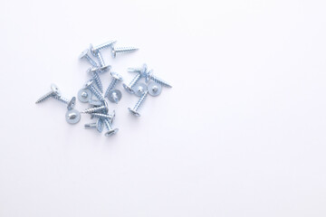 screws arranged on a light background.