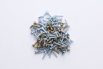 screws arranged on a light background.