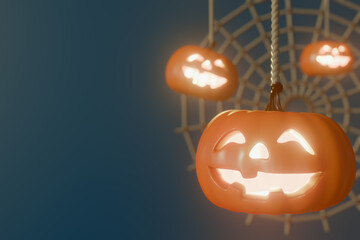 Halloween glowing jack-o-lanterns hanging on a spider web decoration. 3d rendering