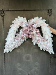 christmas wreath in the shape of wings