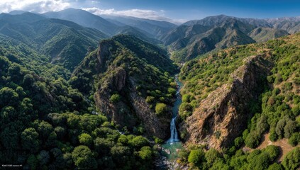 Fototapeta premium Mountainous valley with waterfall