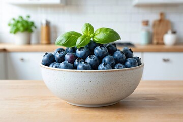A Fresh Bowl of Juicy Blueberries Topped with Aromatic Basil Leaves in a Bright Kitchen Setting Perfect for Healthy Snacking or Cooking
