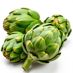 Obraz premium Fresh artichokes, vibrant green, isolated on white. Perfect for culinary or healthy lifestyle concepts, nature, vegan, macro