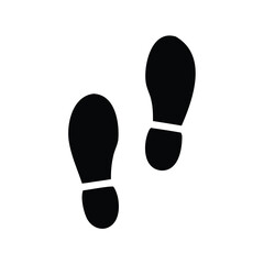 Two black footprints on a white background indicating the direction of travel
