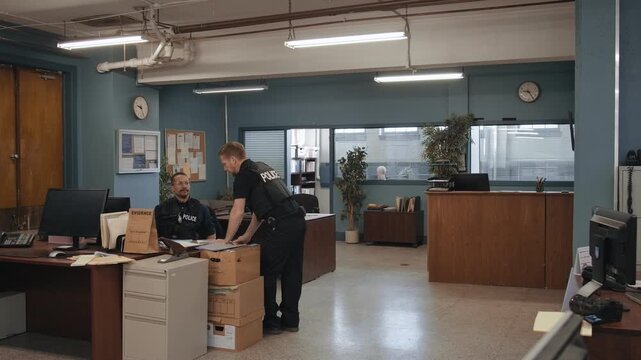 Police precinct wide angle view of two cops