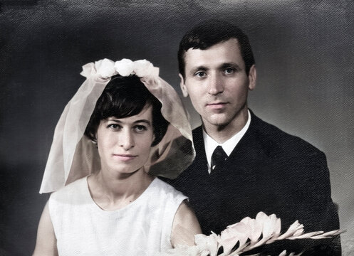 Vintage portrait of young man and woman on their wedding day. Retro photo 1970. - Powered by Adobe