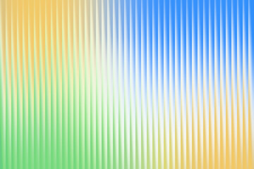 Vibrant abstract background with vertical ribbed texture in a colorful blend of green, yellow, orange, and blue