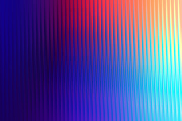 Abstract vertical gradient of vibrant colors, from deep blue to bright red and yellow, with a ribbed texture creating a sense of depth and movement