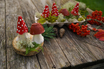 Fall craft from eco-conscious materials, combining natural and recycled elements into a mushroom.