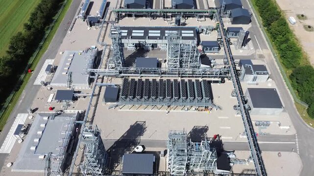Aerial view of European Energy&rsquo;s Power-to-X facility in Kass&oslash;, Denmark, surrounded by fields, solar panels and green energy infrastructure