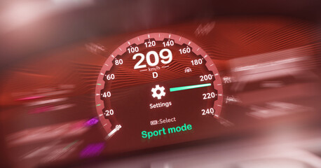 A car dashboard driving 209 kilometers per hour, selective focus