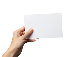 Obraz premium Hand holding a blank white card for text or design on a dark background isolated on transparent background
