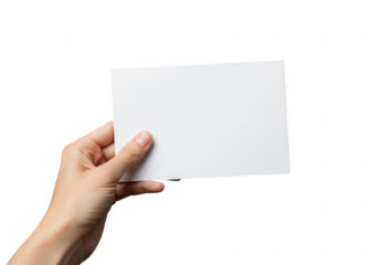 Hand holding a blank white card for text or design on a dark background isolated on transparent background