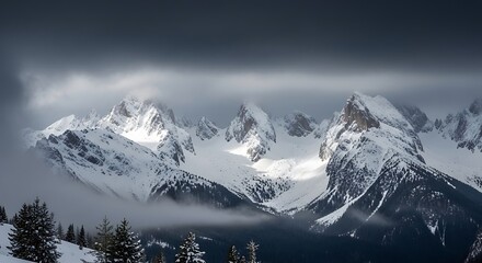 Snowy Mountain Peaks with Dramatic Light.