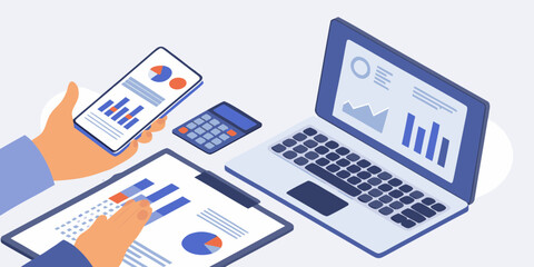 Person analyzing financial data and charts on a laptop smartphone and clipboard with calculator