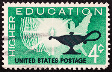 UNITED STATES OF AMERICA - CIRCA 1962.Postage stamps printed in USA, Higher Education Issue, shows Map of US and Lamp, circa 1962