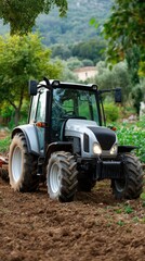 Wheels of a tractor glide through dark soil, leaving bright trails of light as the sun sets, showcasing the beauty of farmland