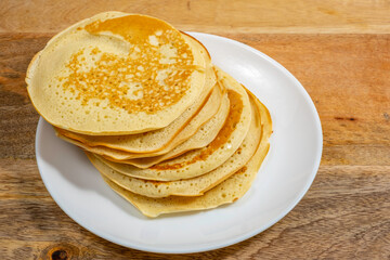 Pancake or crepes for Butter Week on ceramic plate.
