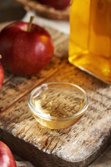 Apple cider vinegar in a glass bowl on a table