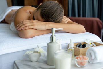 Caucasian woman customer enjoying relaxing anti-stress spa massage and pampering with beauty skin...