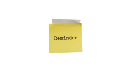 A Reminder note on a yellow sticky note.