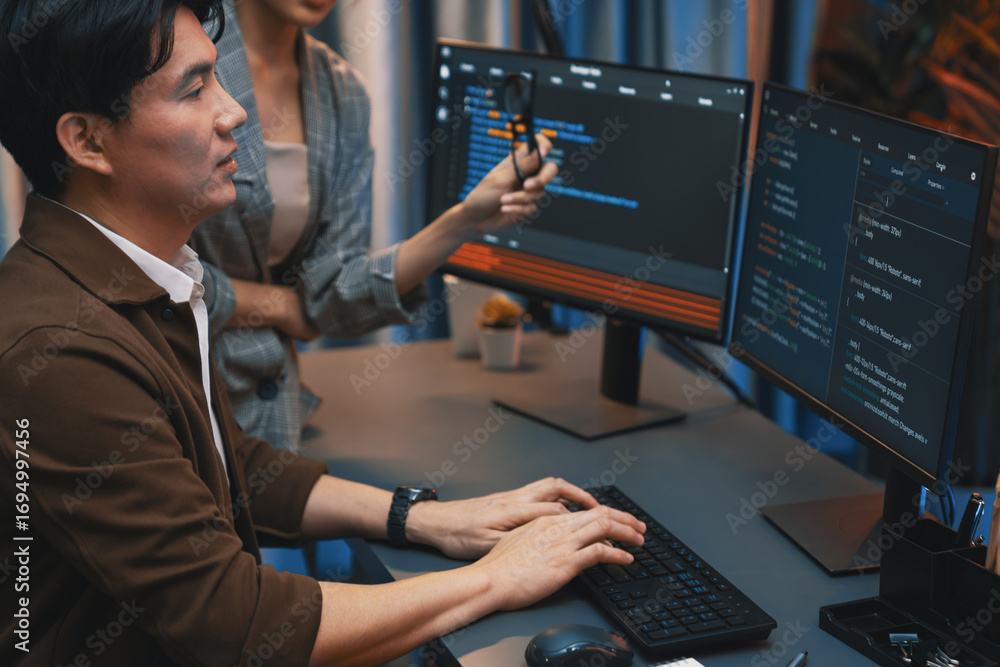 Poster it developers discussing with point to intelligent website development coder system running data onl