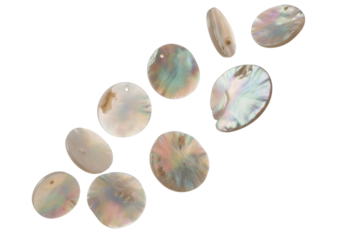 Delicate, iridescent mother-of-pearl discs with pink, blue, and purple hues, suspended on a transparent bokeh studio background with copy space, concept of delicate natural elegance