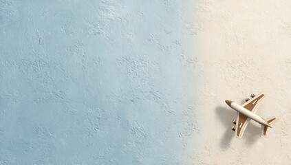 Small airplane on light blue and beige textured surfaces