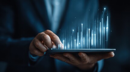 Businessman Deeply Engrossed in Analysis with a HighTech Tablet under Modern Ambiance Great for Business and Tech Projects, Inspiring Innovation and Concentration.