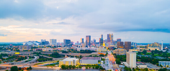 Atlanta, GA skyline at twilight, including the State Capitol Building