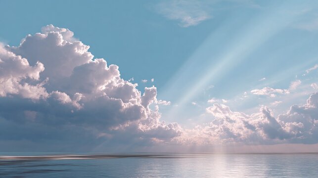 Sun rays shining through clouds over tranquil water surface. Blue sky background with white cumulus cloud formation. Nature landscape for calming atmosphere.