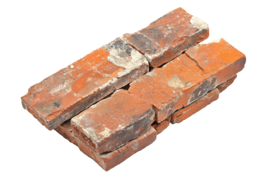 Old red bricks stacked together isolated on transparent background. Cracked red brick wall isolated on white background.