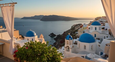Fototapeta premium View of santorini greece with blue domed churches and ocean at sunset from balcony with curtains